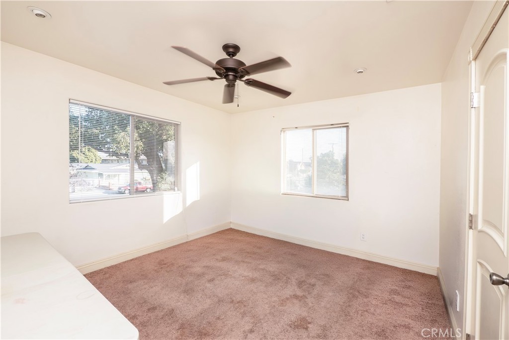 4459 Merced Avenue Baldwin Park, CA 91706 - Photo 34 of 40 a view of a big room with wooden floor and windows