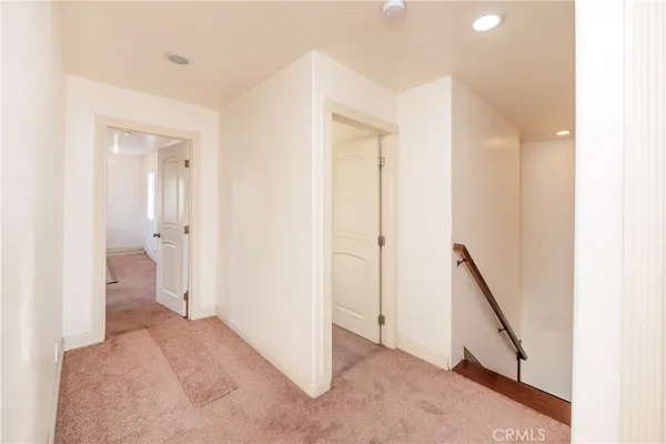 a view of a bathroom with white walls