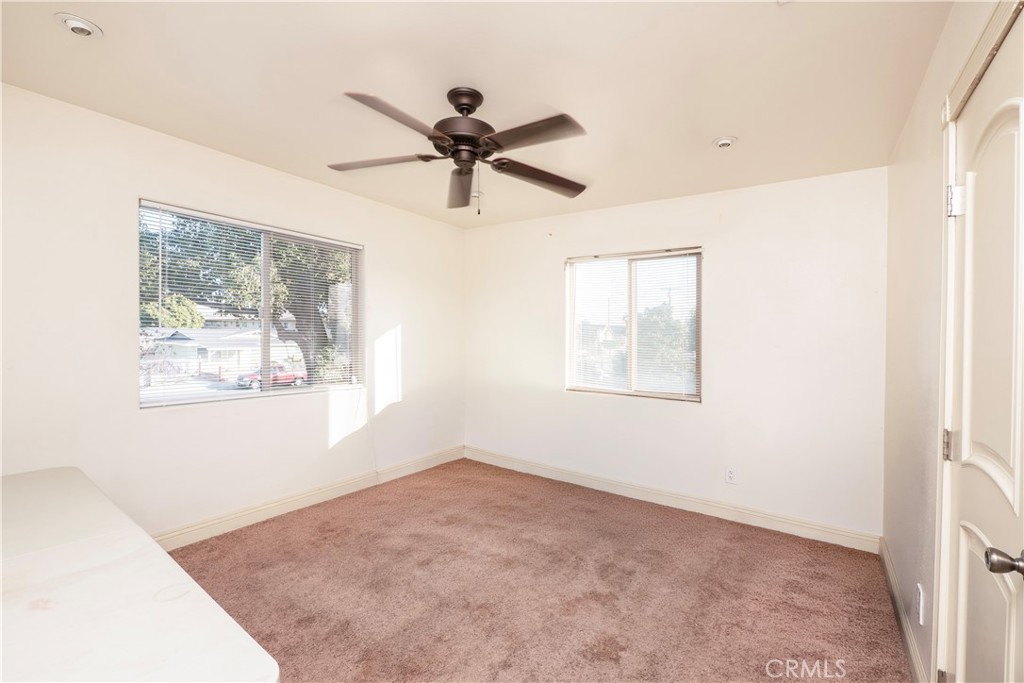 4459 Merced Avenue Baldwin Park, CA 91706 - Photo 35 of 40 a view of a big room with wooden floor and windows
