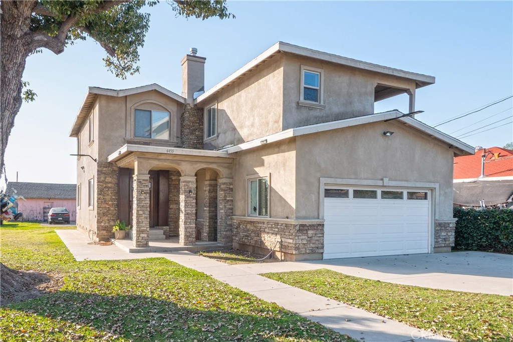4459 Merced Avenue Baldwin Park, CA 91706 - Photo 4 of 40 a view of a house with roof deck