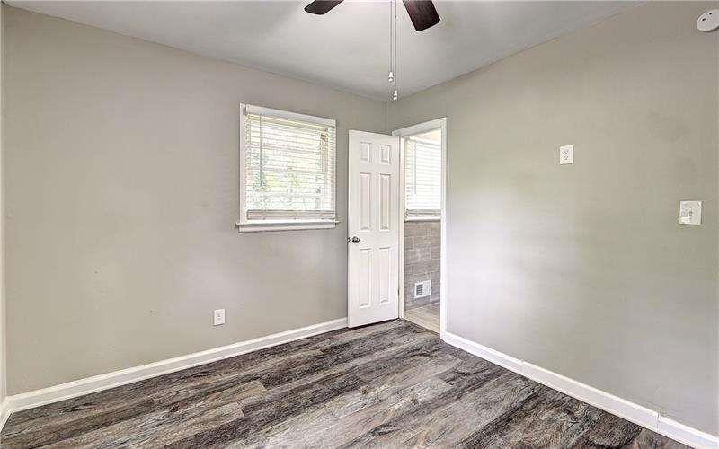4973 White Boulevard Southwest Mableton, GA 30126 - Photo 16 of 22 a view of an empty room with a window