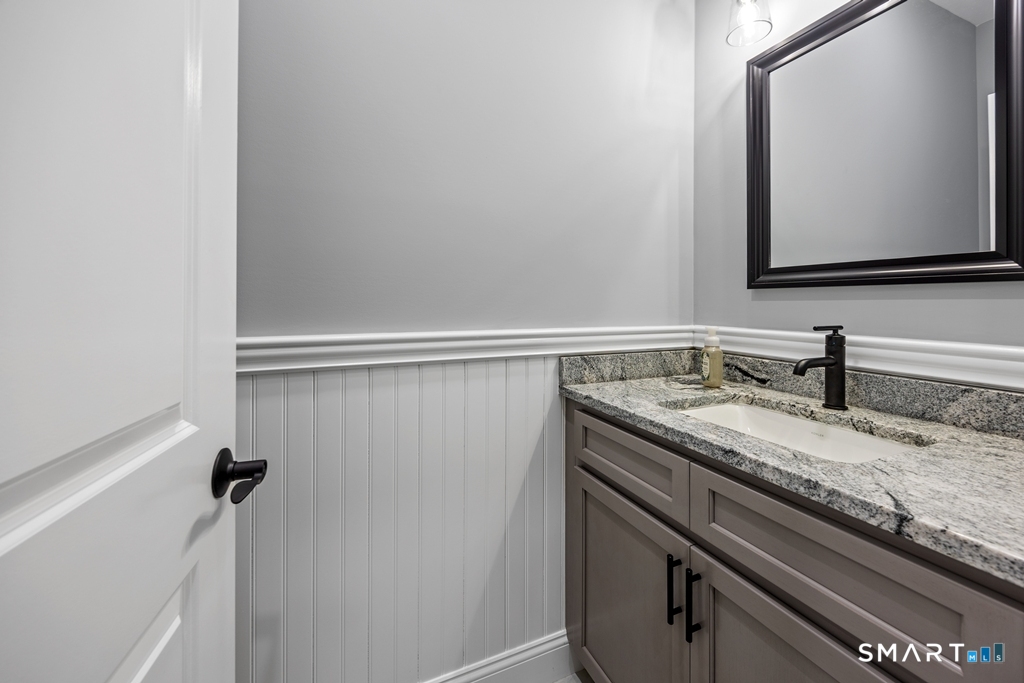 210 Munson Road, Unit 2G Wolcott, CT 06716 - Photo 10 of 23 a view of a sink and mirror