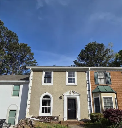 a front view of a house with windows