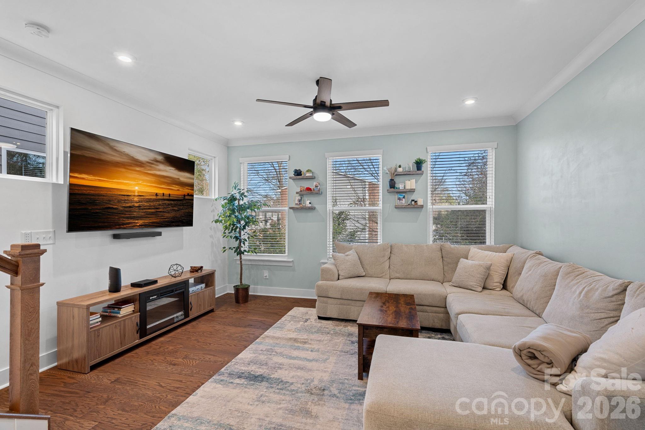 4012 Capital Ridge Charlotte, NC 28205 - Photo 1 of 28 a living room with furniture and a flat screen tv