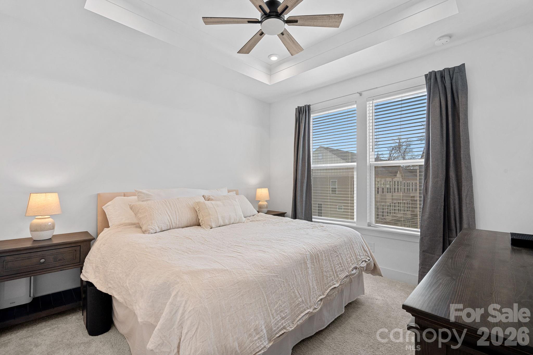 4012 Capital Ridge Charlotte, NC 28205 - Photo 14 of 28 a bedroom with a bed and window