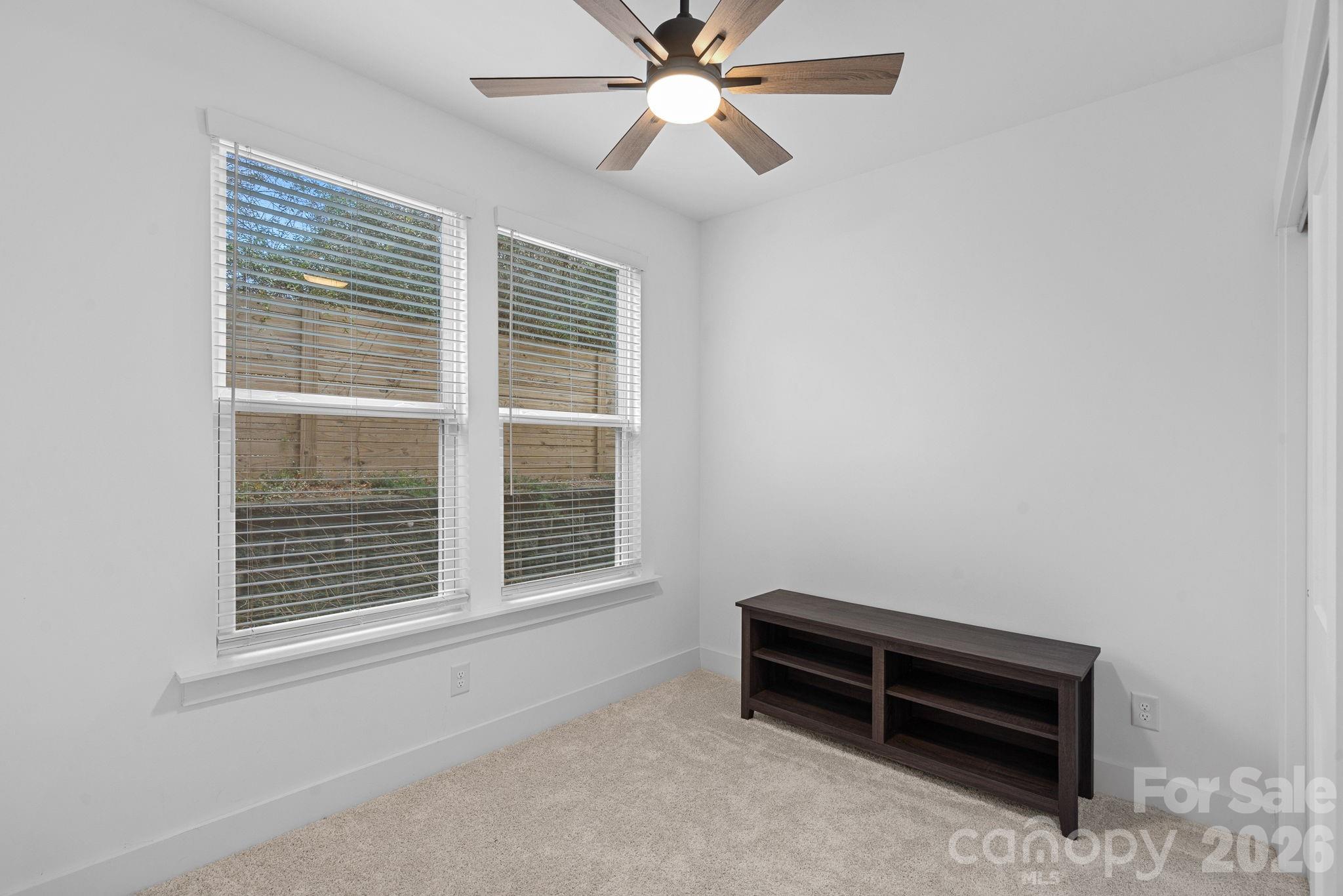 4012 Capital Ridge Charlotte, NC 28205 - Photo 20 of 28 a bench sitting in a room next to a window