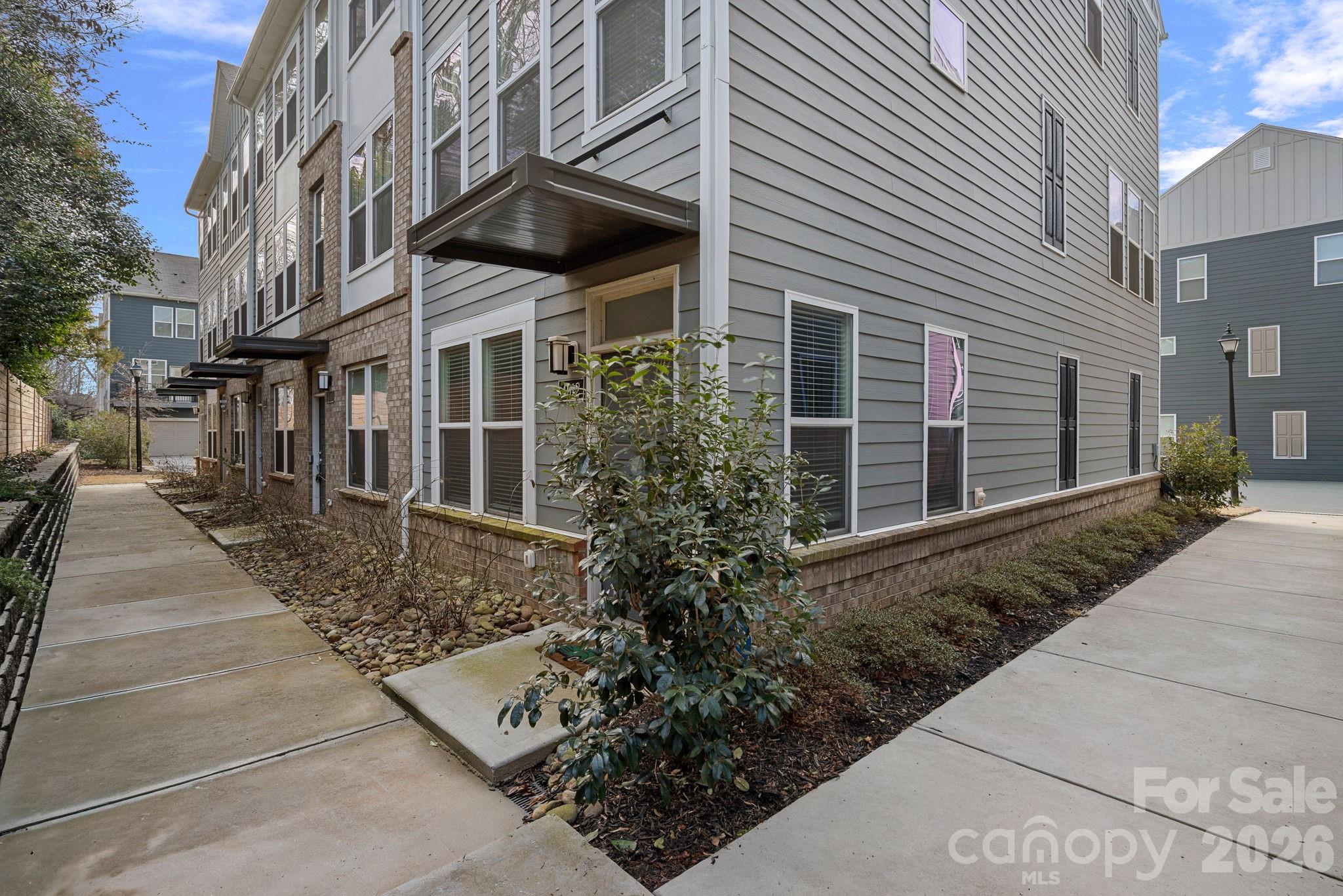 4012 Capital Ridge Charlotte, NC 28205 - Photo 23 of 28 a view of a house with a yard