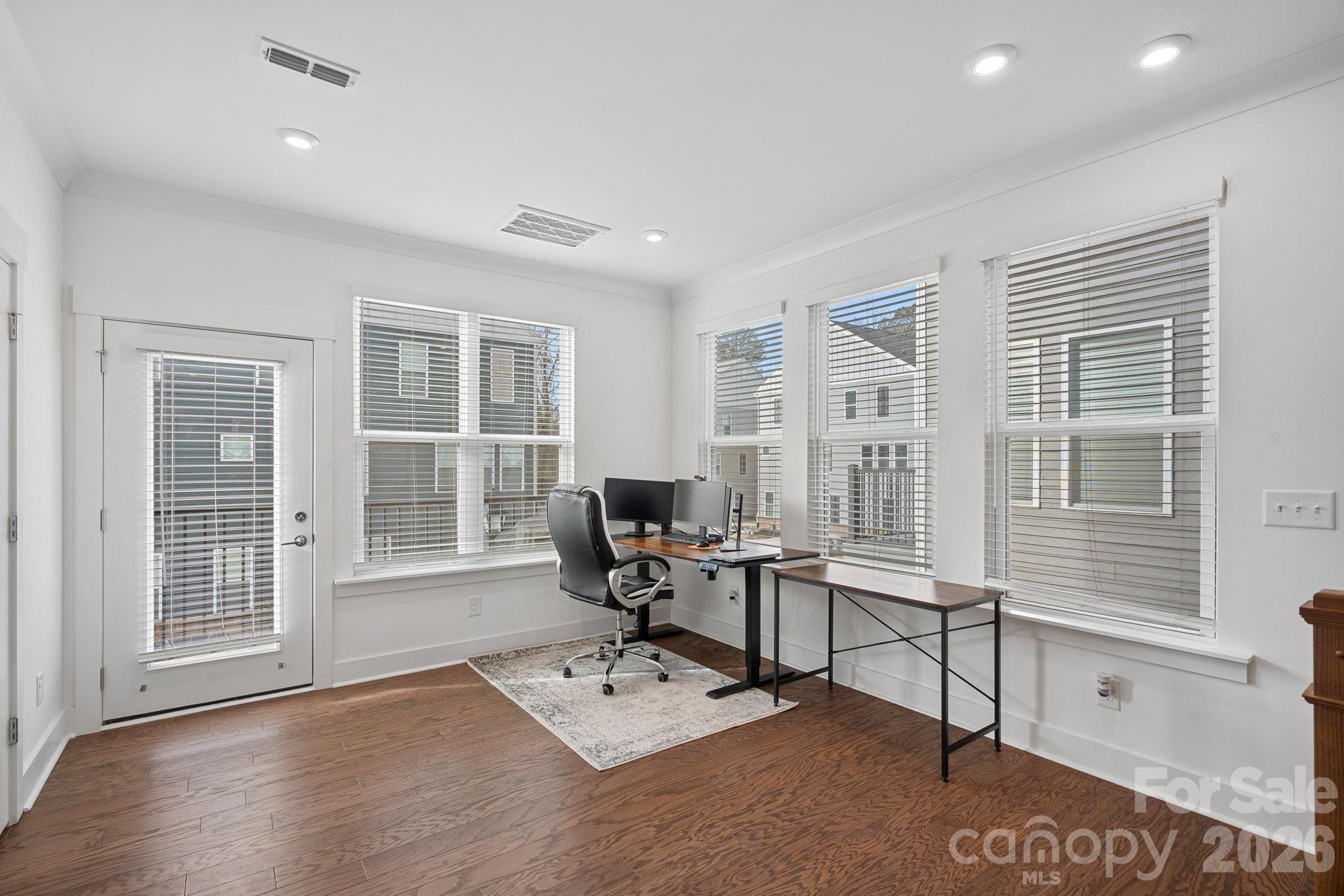 4012 Capital Ridge Charlotte, NC 28205 - Photo 5 of 28 a work room with furniture and windows