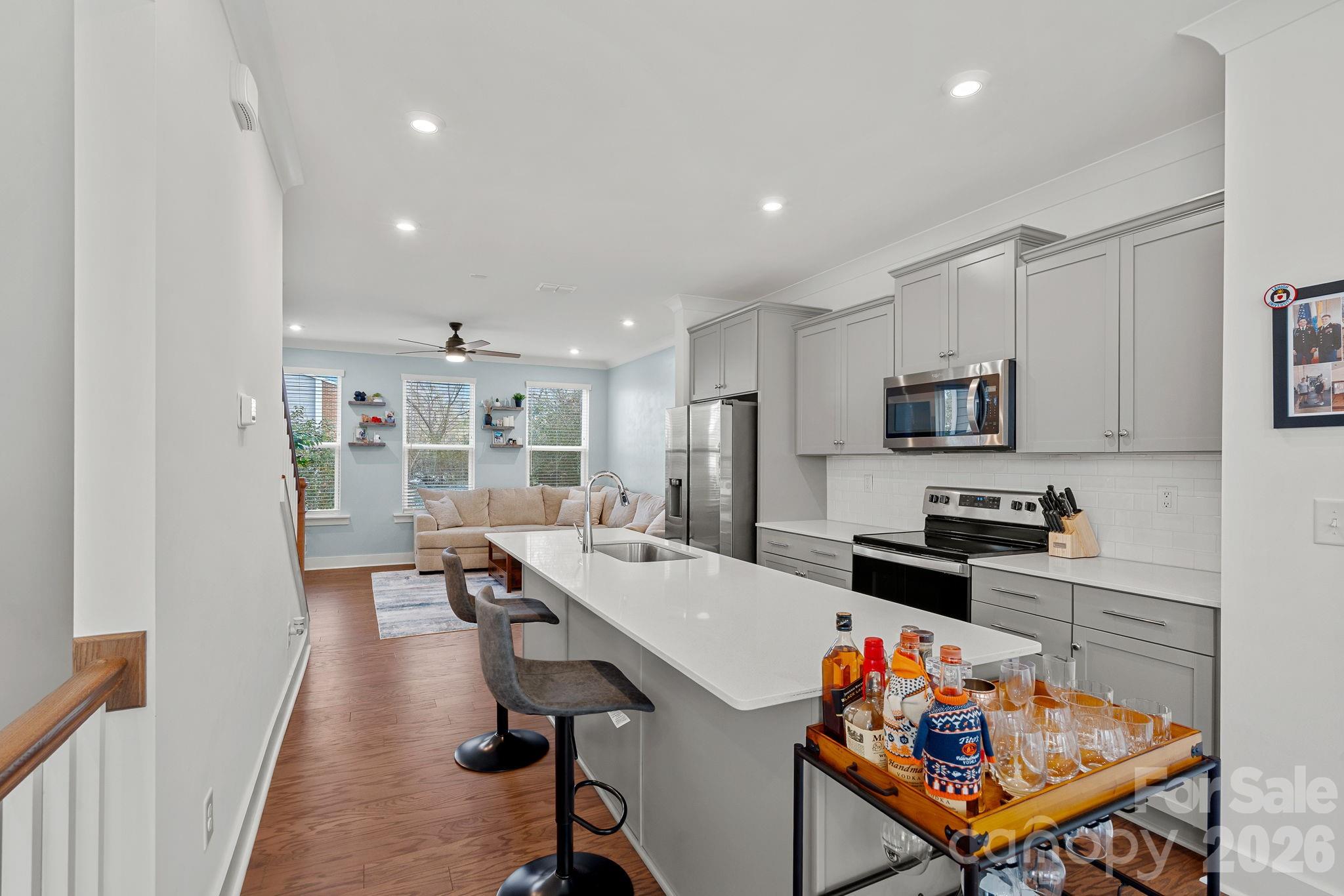 4012 Capital Ridge Charlotte, NC 28205 - Photo 7 of 28 a large kitchen with a table and chairs in it