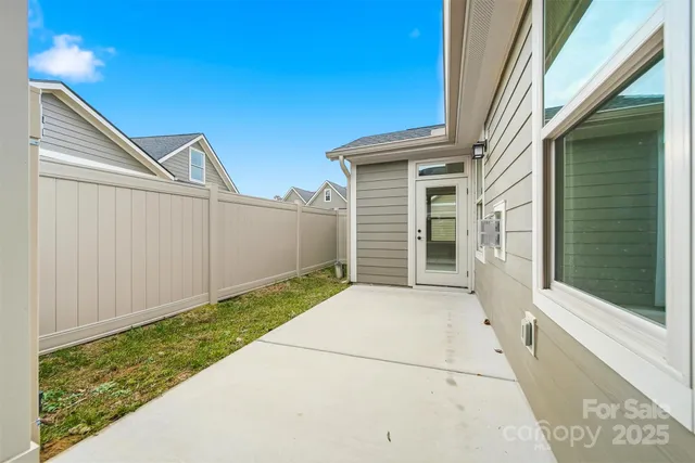 a view of a back yard of the house
