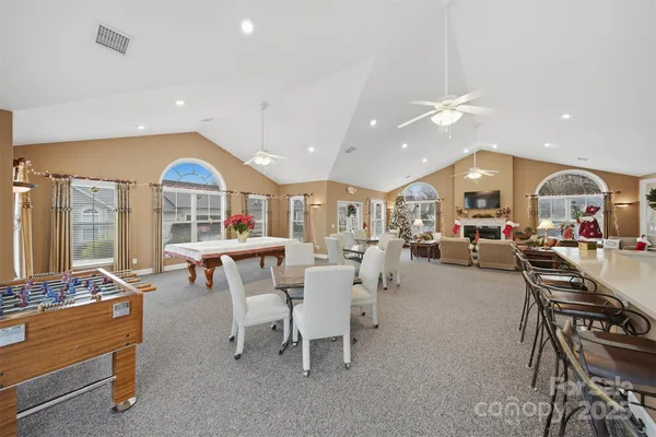 a large kitchen with a lot of counter space and a sink