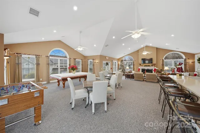 a large kitchen with a lot of counter space and a sink