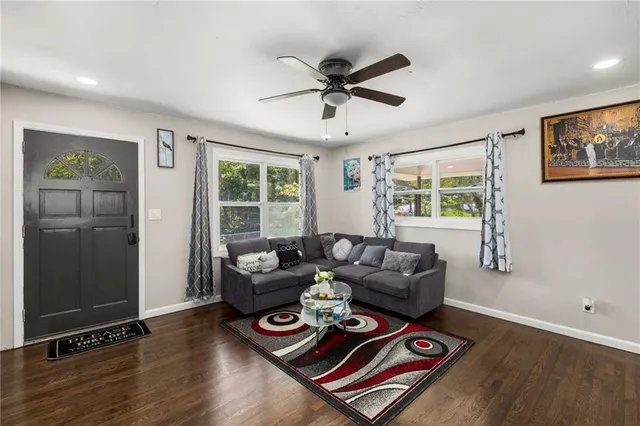 a living room with furniture and a window
