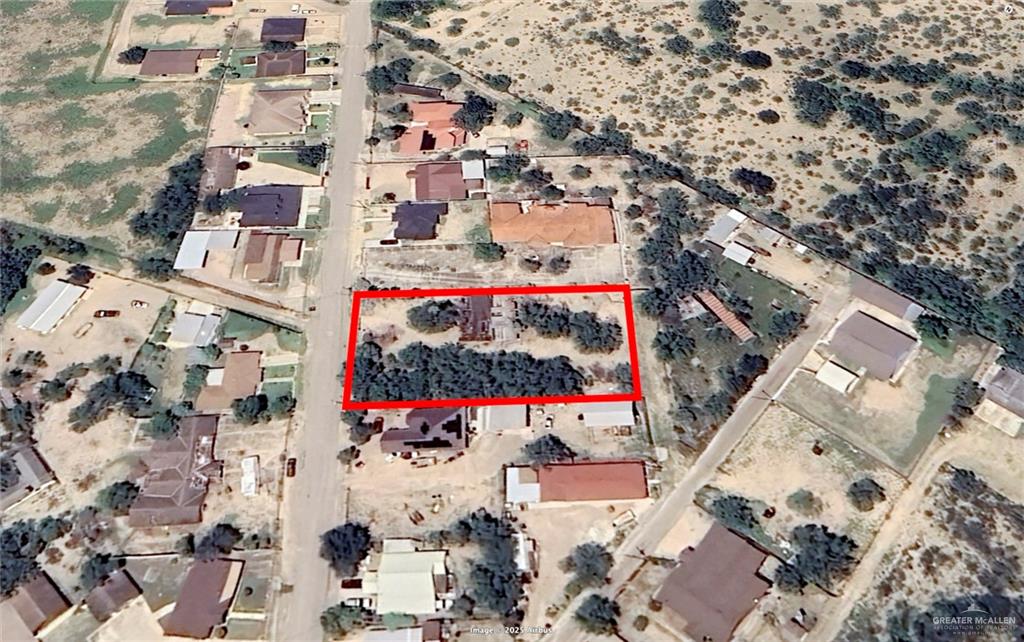 0 Alamo Roma, TX 78584 - Photo 3 of 7 an aerial view of residential houses and outdoor space