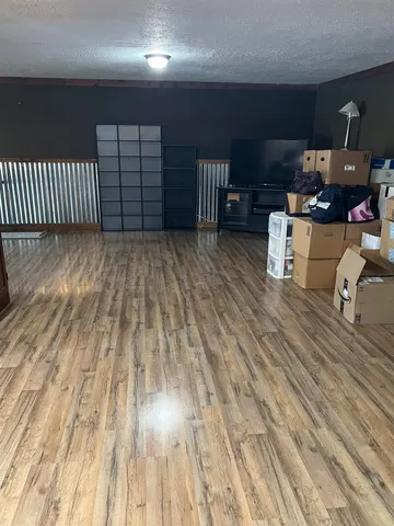 a bathroom with a toilet sink and shower