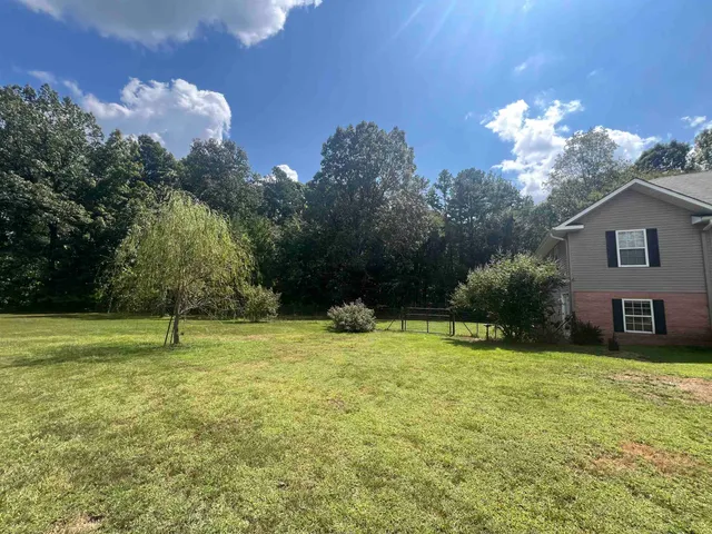 a house in middle of a field