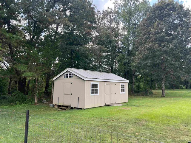 a view of a backyard with a garden