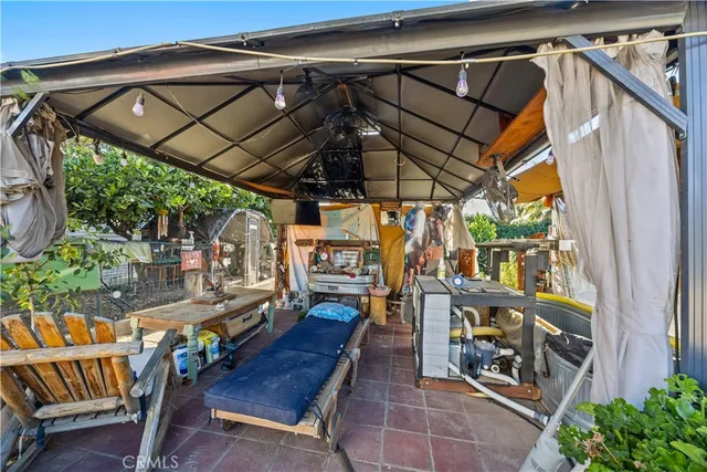 a kitchen with stainless steel appliances granite countertop a stove oven and white cabinets
