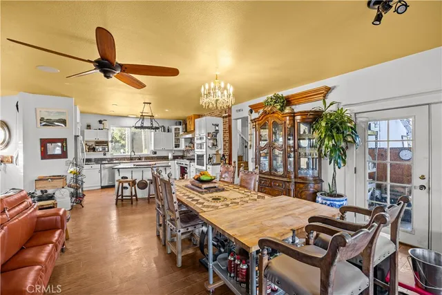a view of a patio with a table and chairs