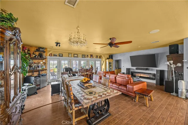 a bed room with a bed and a flat screen tv