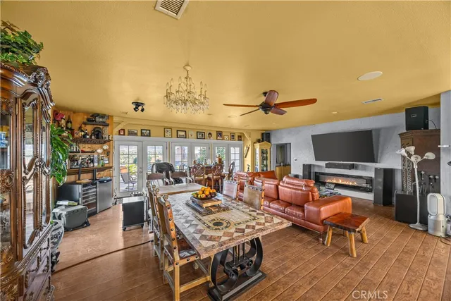 a bedroom with a bed and glass window