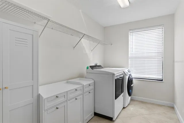 a living room with furniture and decor