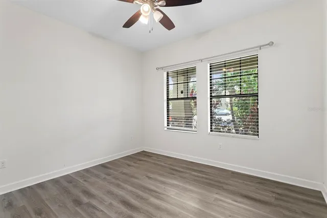 an aerial view of residential houses with outdoor space and swimming pool