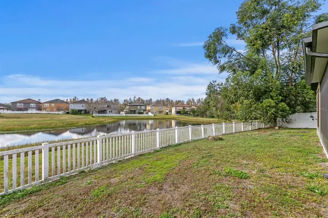 an aerial view of a house with a garden