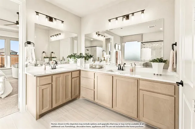 a bathroom with a sink vanity and mirror