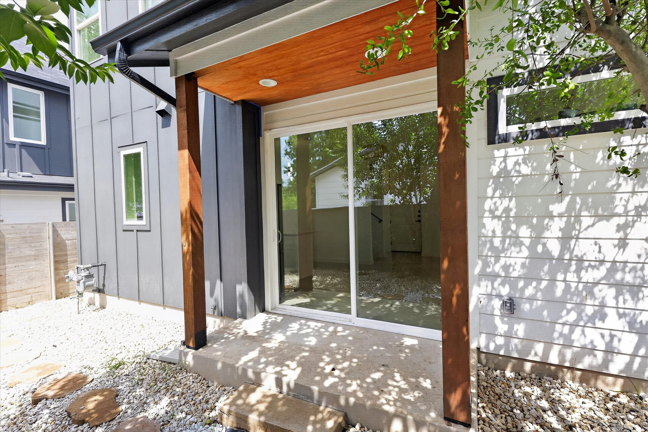 5305 Ledesma Road, Unit 1 Austin, TX 78721 - Photo 28 of 29 Clean lines and a blend of modern materials define this inviting exterior with natural light.