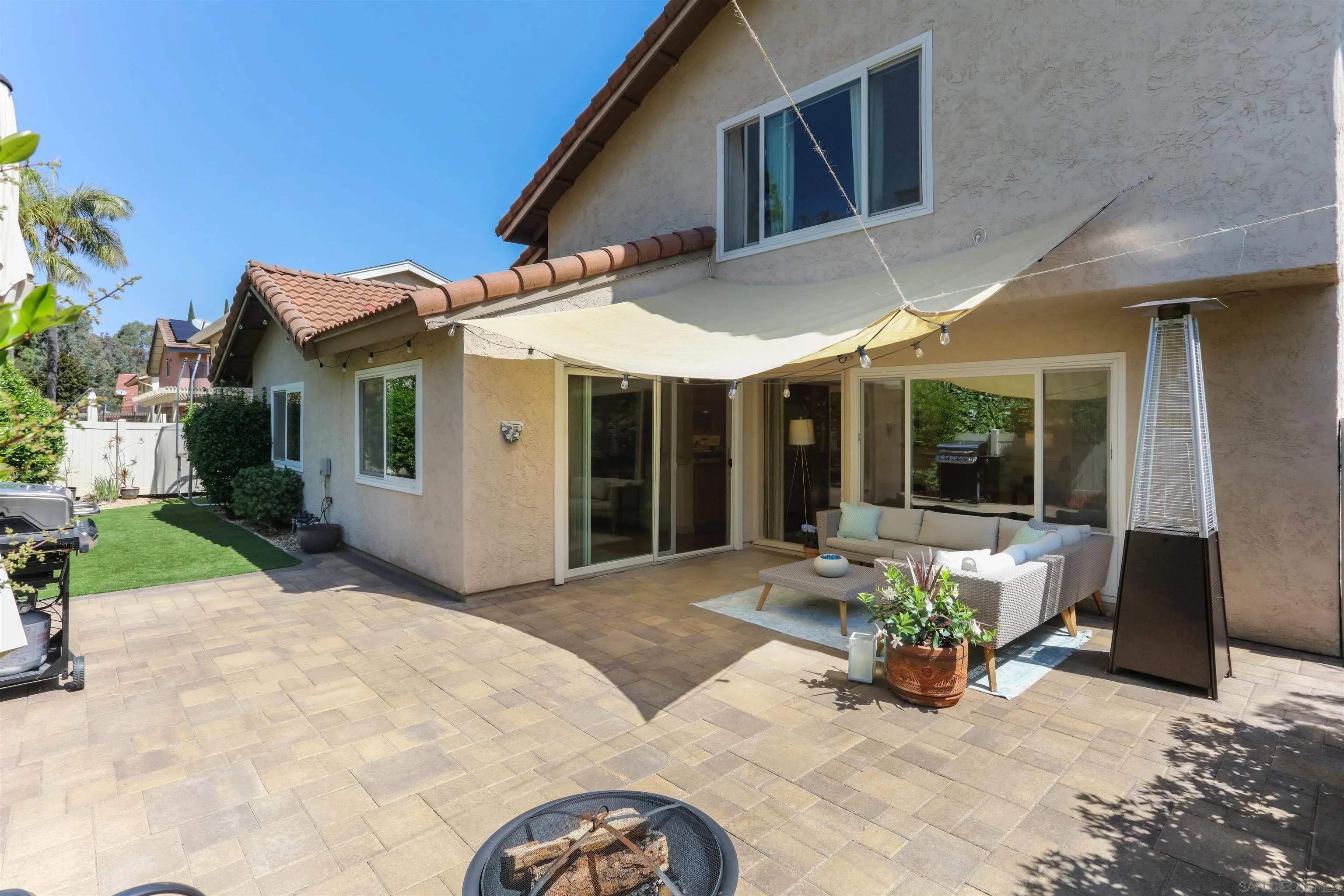 17062 Matinal Road San Diego, CA 92127 - Photo 31 of 42 a view of a house with backyard porch and sitting area