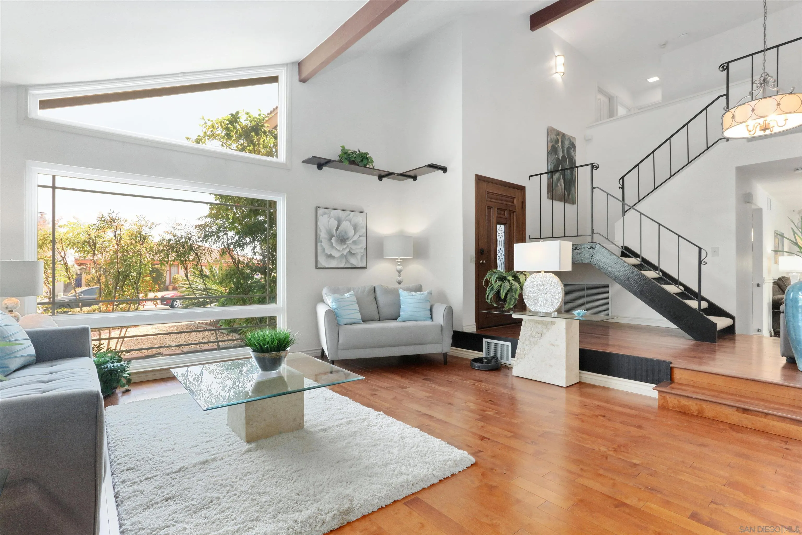 17062 Matinal Road San Diego, CA 92127 - Photo 6 of 42 a living room with furniture and a large window