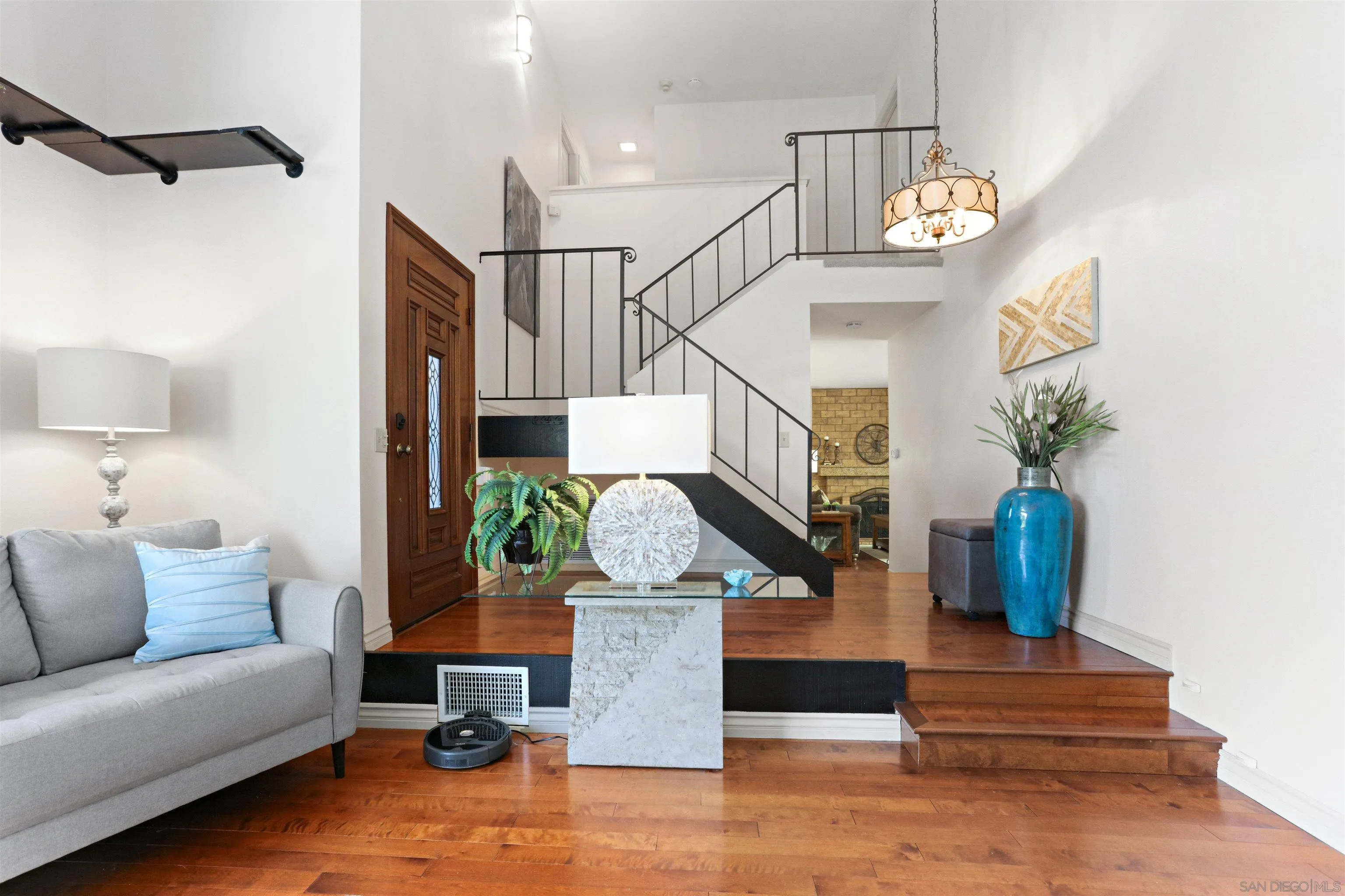 17062 Matinal Road San Diego, CA 92127 - Photo 7 of 42 a view of entryway and hall with wooden floor