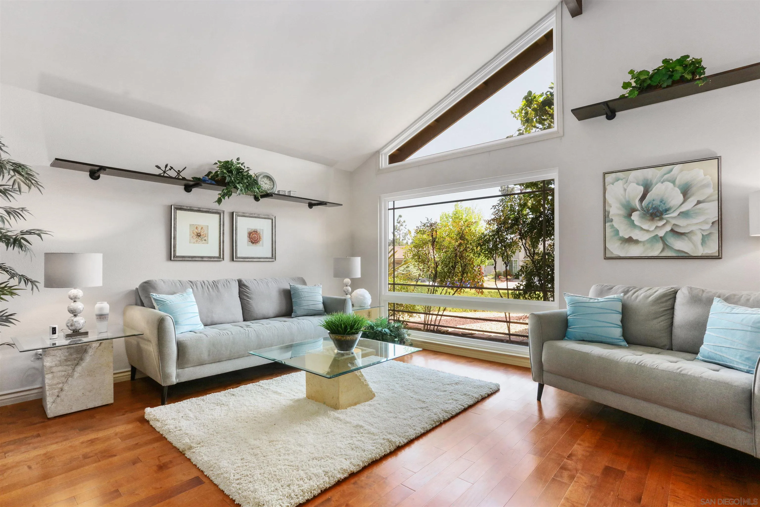 17062 Matinal Road San Diego, CA 92127 - Photo 8 of 42 a living room with furniture and a large window