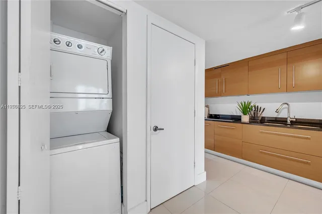 a utility room with washer and dryer