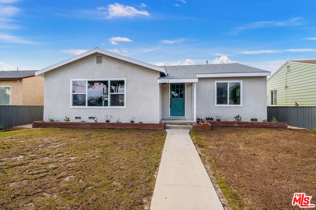 13927 Studebaker Road Norwalk, CA 90650 - Photo 1 of 27 a swimming pool view with a outdoor space