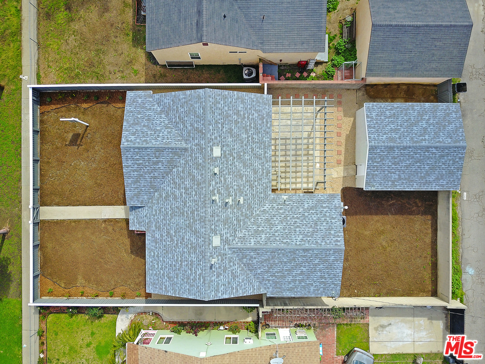 13927 Studebaker Road Norwalk, CA 90650 - Photo 27 of 27 an aerial view of residential house with outdoor space