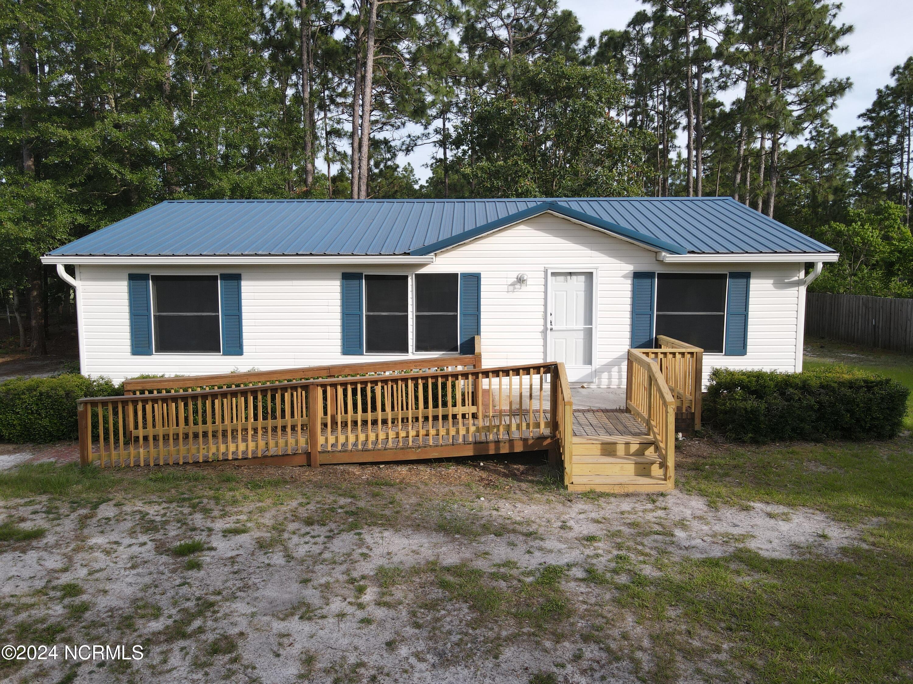 7331 Hunters Ridge Drive Leland, NC 28451 - Photo 1 of 31 Front