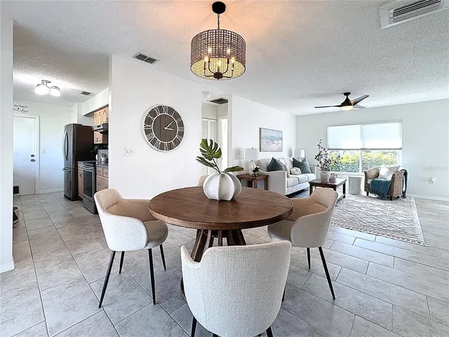 a view of a dining room with furniture