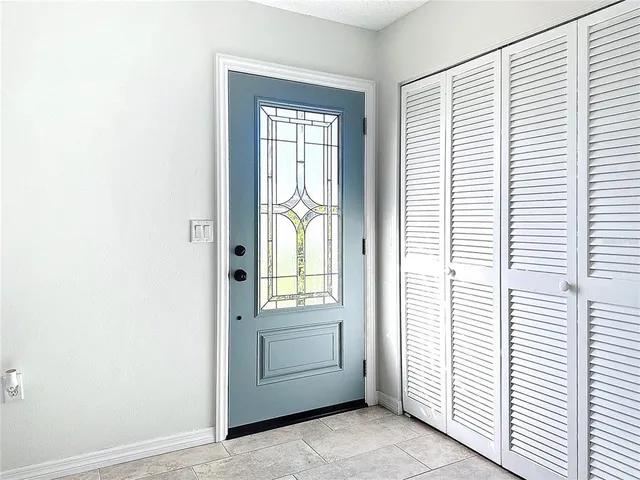 a living room with furniture or couch and a window