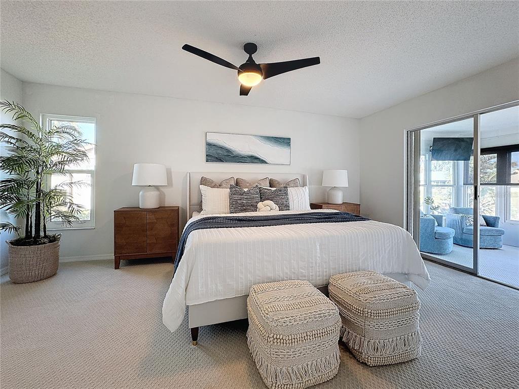 5011 Mangrove Point Road Bradenton, FL 34210 - Photo 10 of 49 a bedroom with a bed and window