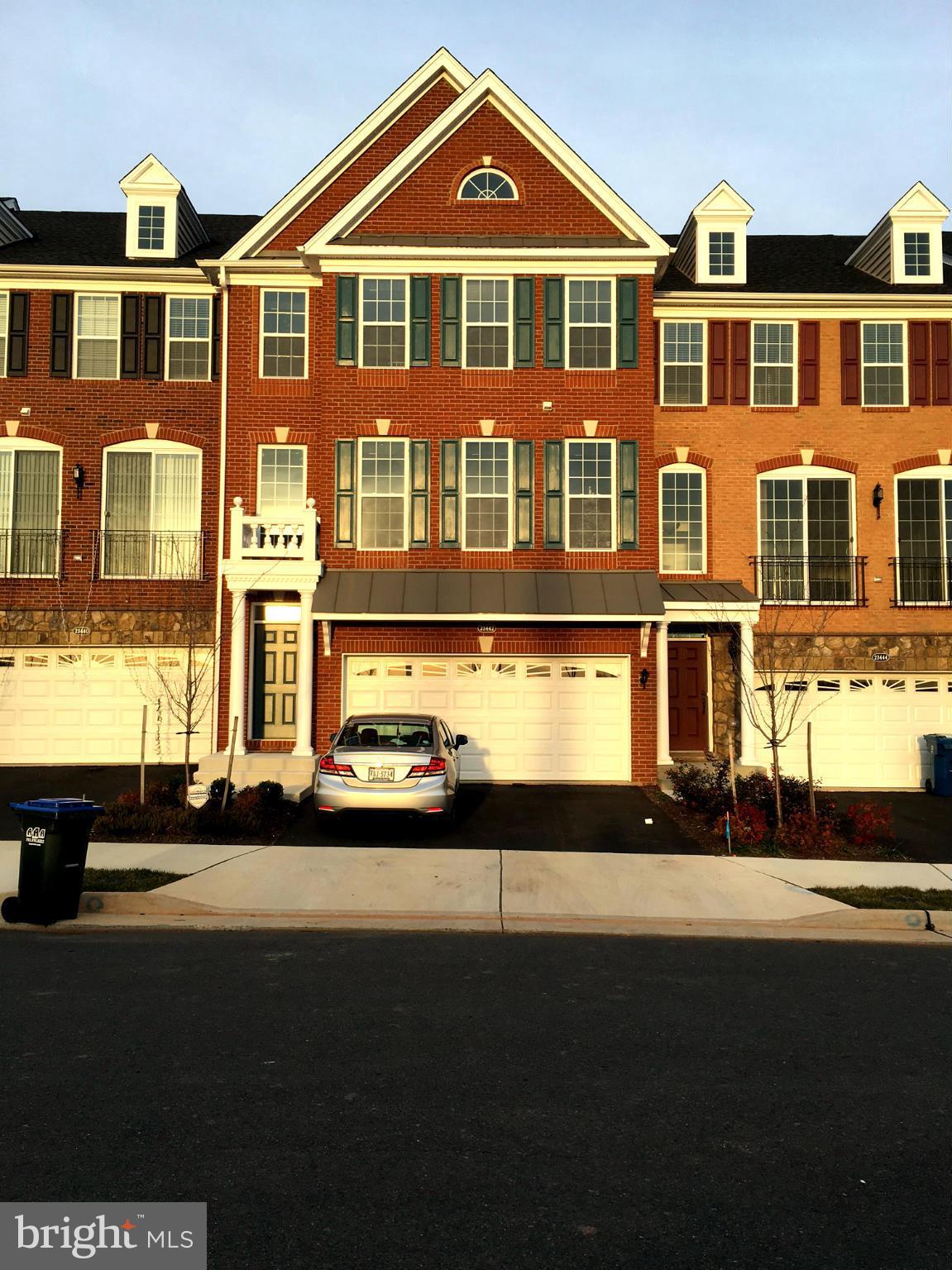 23442 Colts Run Square Ashburn, VA 20148 - Photo 1 of 1 a front view of a house with a yard