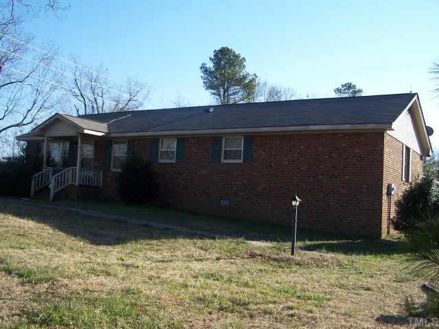 55 Mt Pleasant Road Willow Spring, NC 27592 - Photo 1 of 1 a backyard of a house