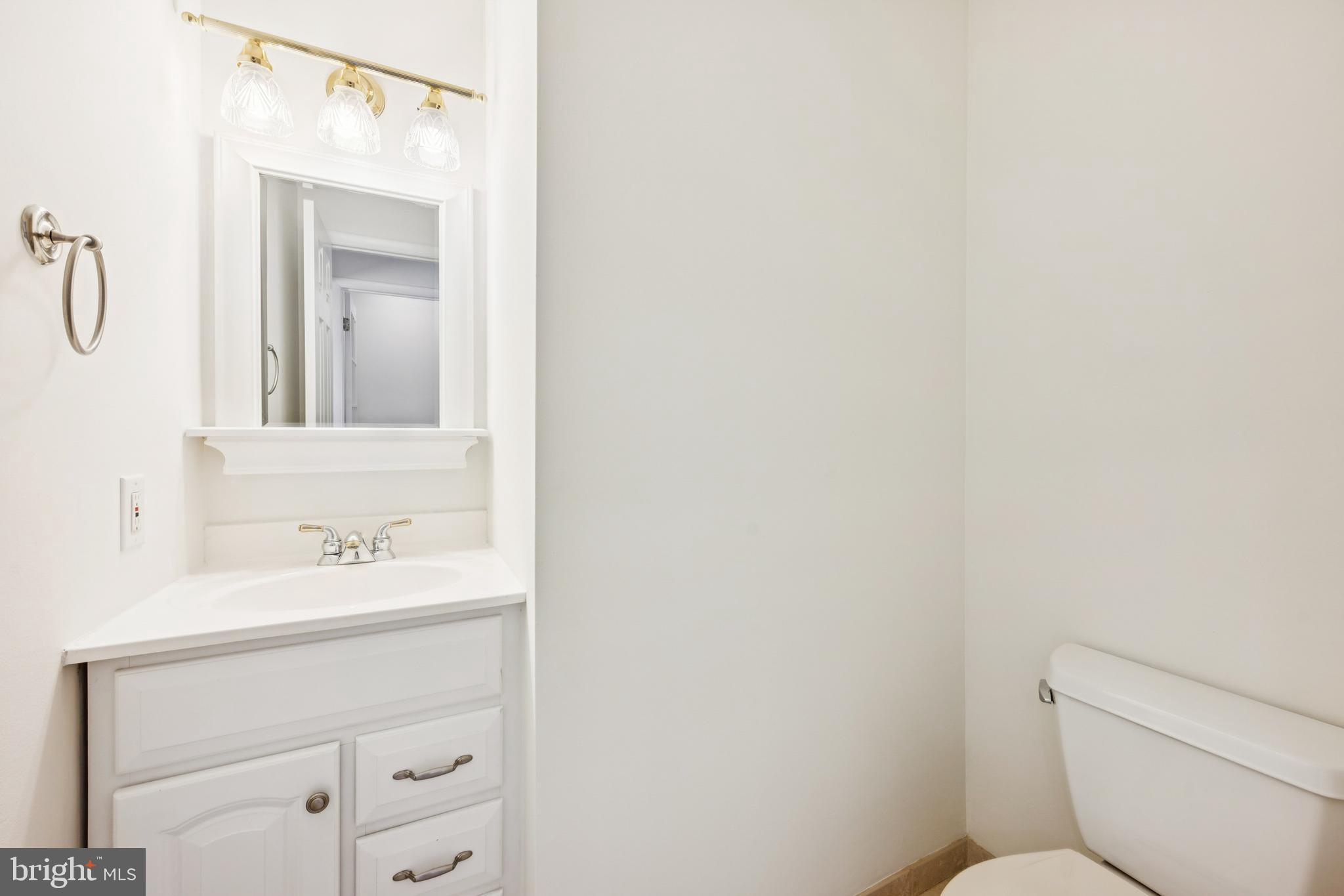 14 Merlot Court Marlton, NJ 08053 - Photo 13 of 24 a bathroom with a toilet sink and mirror