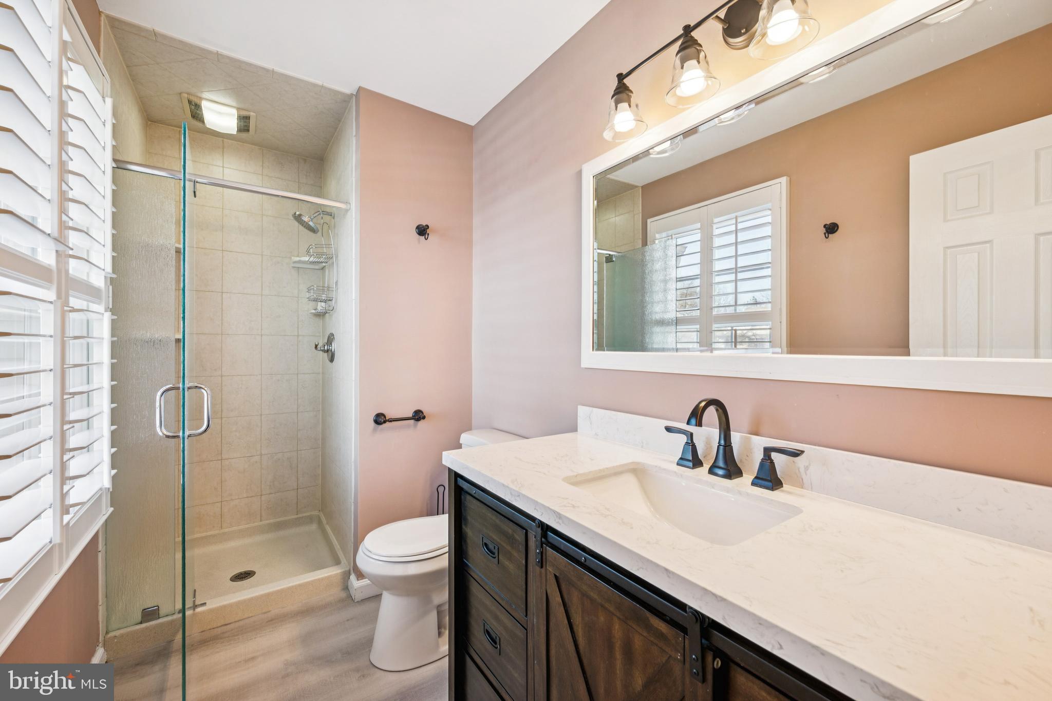 14 Merlot Court Marlton, NJ 08053 - Photo 16 of 24 a bathroom with a sink a toilet and shower