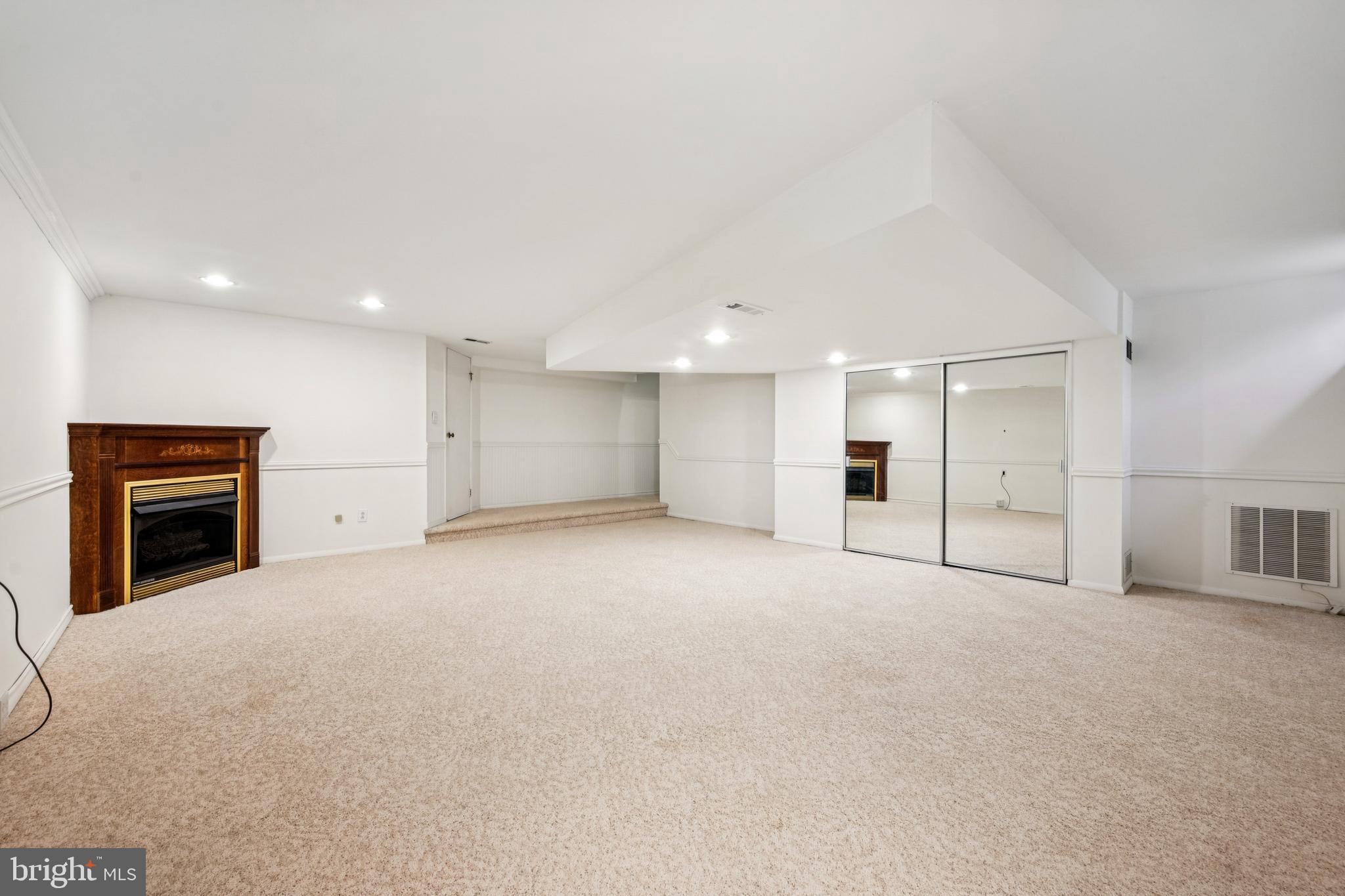 14 Merlot Court Marlton, NJ 08053 - Photo 22 of 24 a view of an empty room with a fireplace and a window