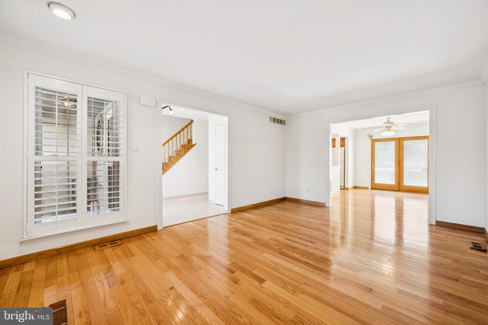 14 Merlot Court Marlton, NJ 08053 - Photo 6 of 24 a view of an empty room with wooden floor and a window