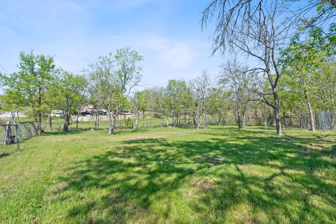 Yard leads down to a green space. Plenty of room!!