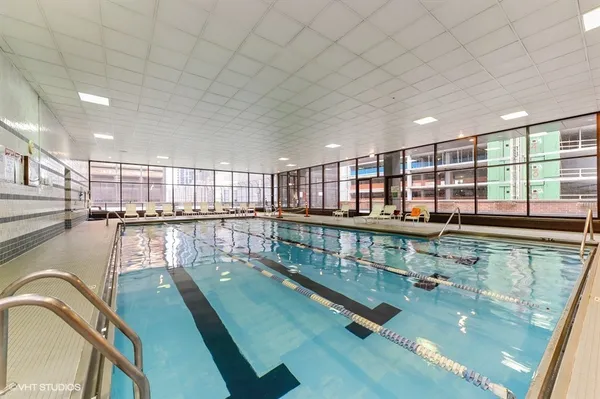 a view of a swimming pool and a balcony