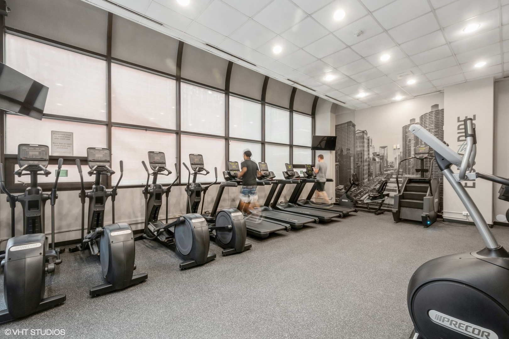 211 East Ohio Street, Unit 2012 Chicago, IL 60611 - Photo 13 of 19 a view of a room with gym equipment